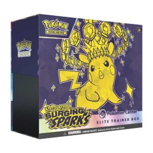 A Pokémon TCG Scarlet & Violet—Surging Sparks Elite Trainer Box featuring a yellow Pikachu with a crown-like design made of energy crystals, set against a dark blue background. The box is branded with the Pokémon logo and includes a warning label at the bottom.